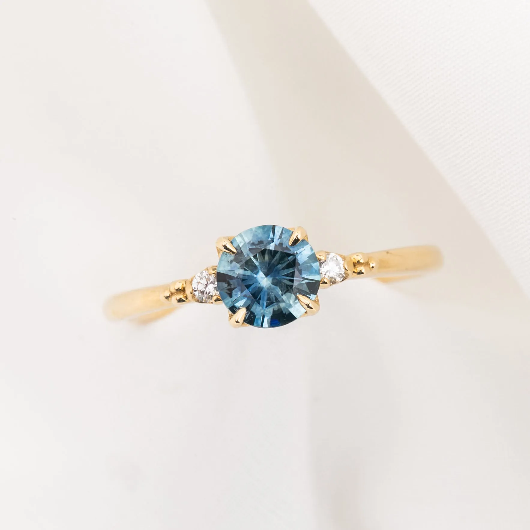 Estel Ring 0.79ct Blue Montana Round Sapphire, 14K Yellow Gold (One of a kind)