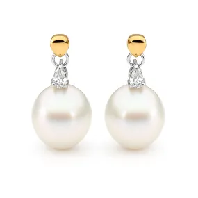 Pear shape diamond and pearl earrings